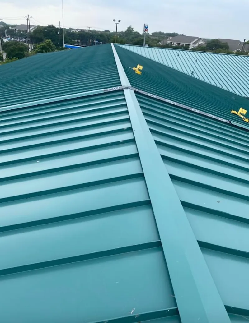 Green commercial metal roof ridge and valley for Metal Roof Repair in Buckley